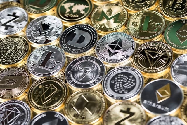 Bitcoin Hits $79,000 as Ethereum, XRP, Dogecoin Rally on CLARITY Act Speculation - Benzinga